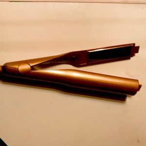 Curler and straightener in one. used twice.